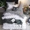 “Mono Stripe Heart Set” – 4-dijelni set posteljine od acetatnih vlakana sa modernim prugastim dizajnom i motivom srca