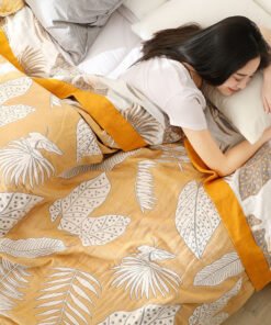 “Leaf Pattern Cotton Blanket” – Pamučna dekorativna deka sa modernim motivima listova